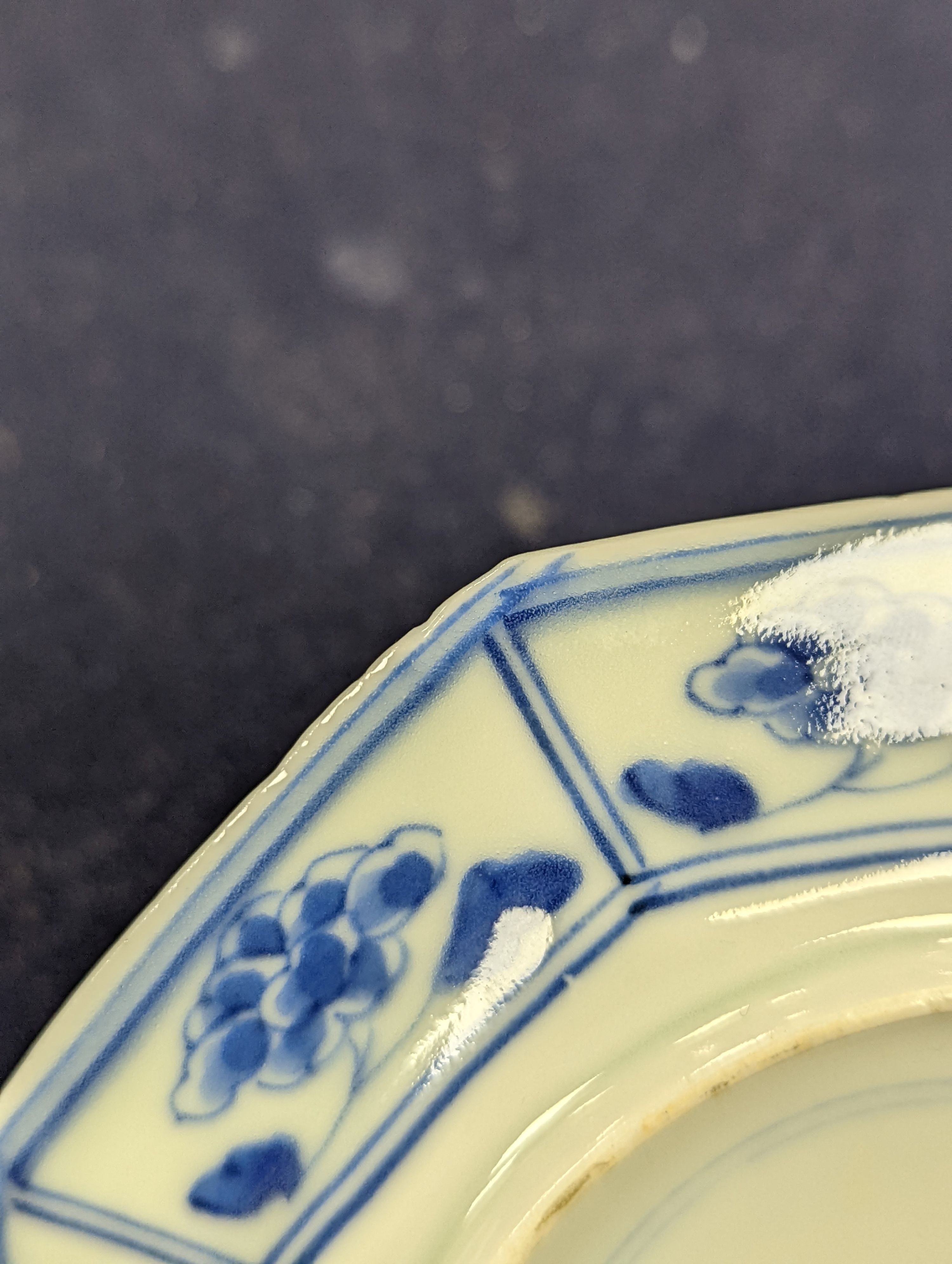 A Japanese blue and white vase, two similar dishes and a tea bowl and saucer